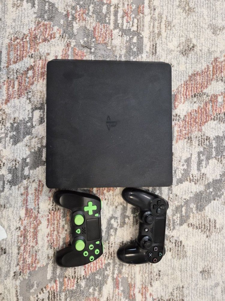 PS4 Slim 500GB Bundle – 2 Controllers + 9 Games