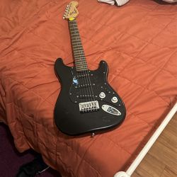 electric guitar Squier Mini