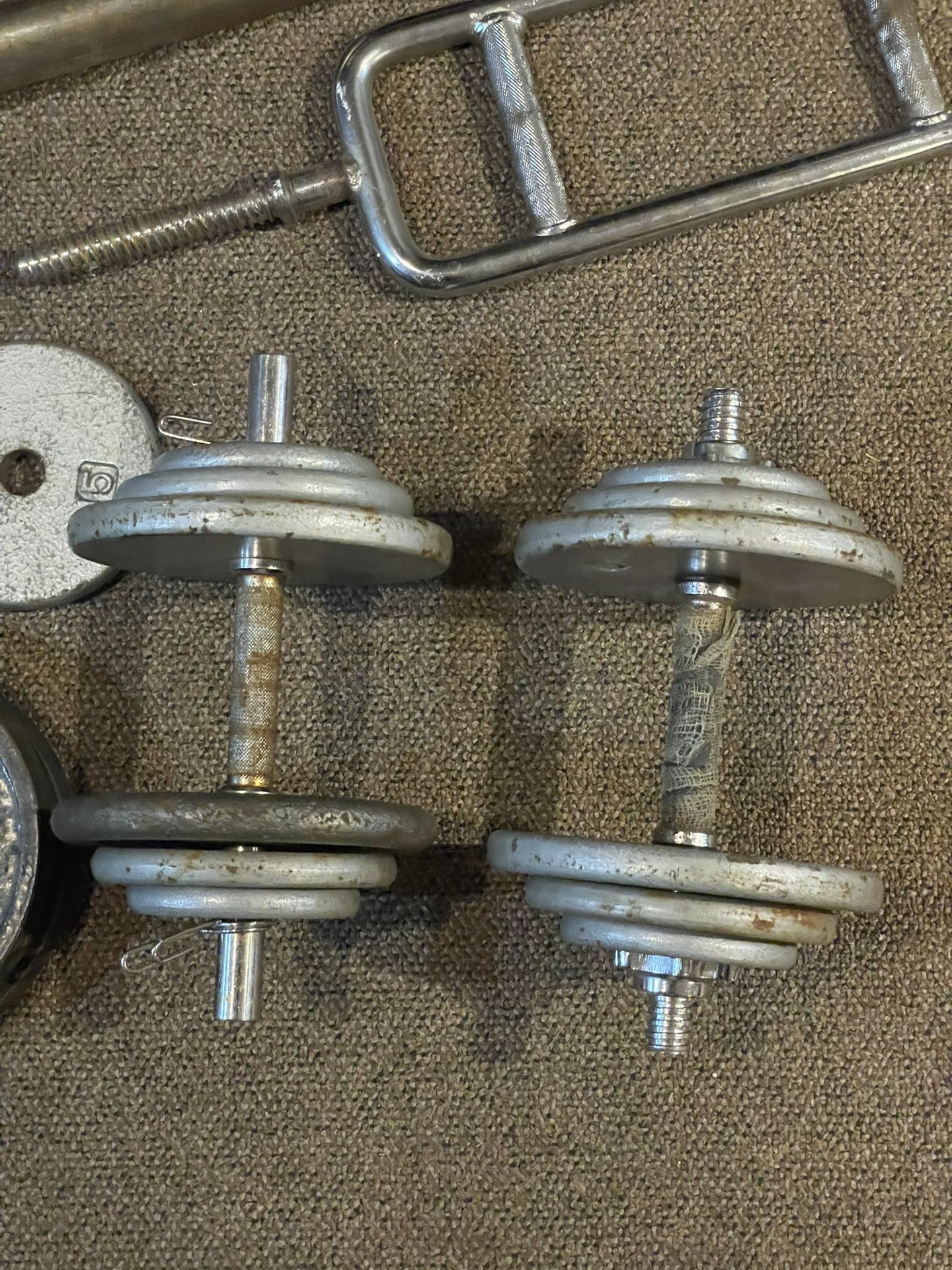 Vintage 70 pound Adjustable Dumbells