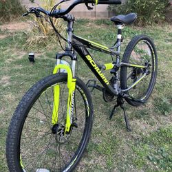 Schwinn Traxion Mountain Bike for Adult Men Women, 29-Inch Wheels, Full Suspension, 24-Speed Shimano Drivetrain, Trigger Shifter, 18-Inch Aluminum Fra