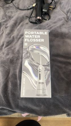 Brand New Portable Water Flosser (Unopened)