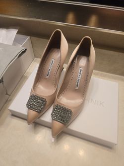 Manolo Blahnik, never worn.