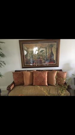 New hardwood cushioned sofa ! Pillows included