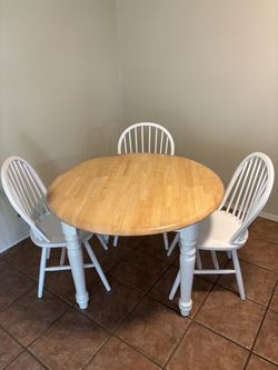 Solid Wood 42” Round Table and 3 Chairs ( good condition)