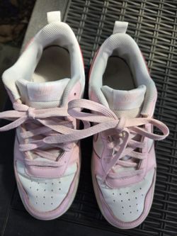 Pink and white Nike size 5/6 good condition