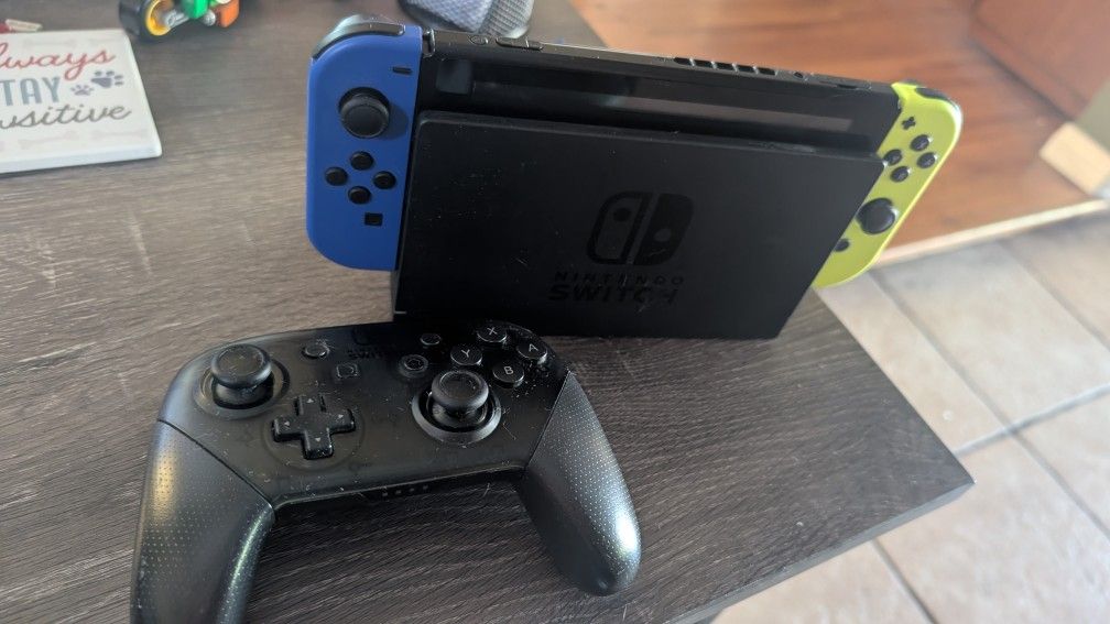 Nintendo Switch, Pro Controller, And Extra Joycons
