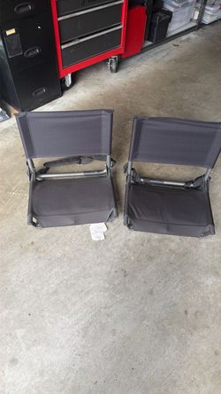 Folding stadium chairs