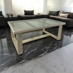 Glass coffee table 50 inches long 32 inches wide by 19.5 inches tall