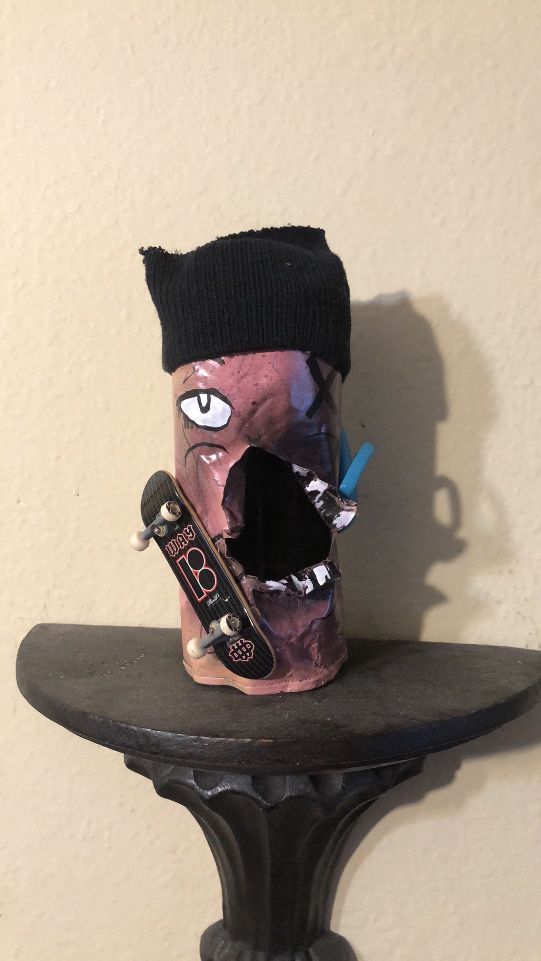 Skate rat sculpture graffiti skateboard art custom handmade by me using mixed mediums of recycled spray can and toys of tech deck, backpack. Painted w