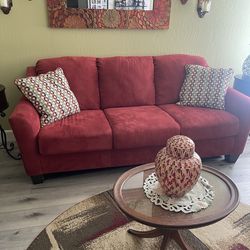 Red sofa used in a living room limited usage