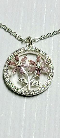 Beautiful Flower Silver necklace with clear and pink stones.