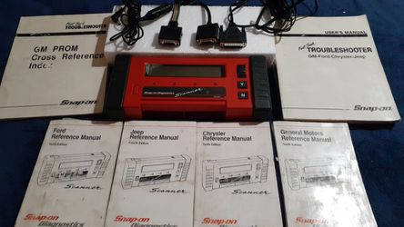 Snap on diagnostic scanner with various modules and manuals