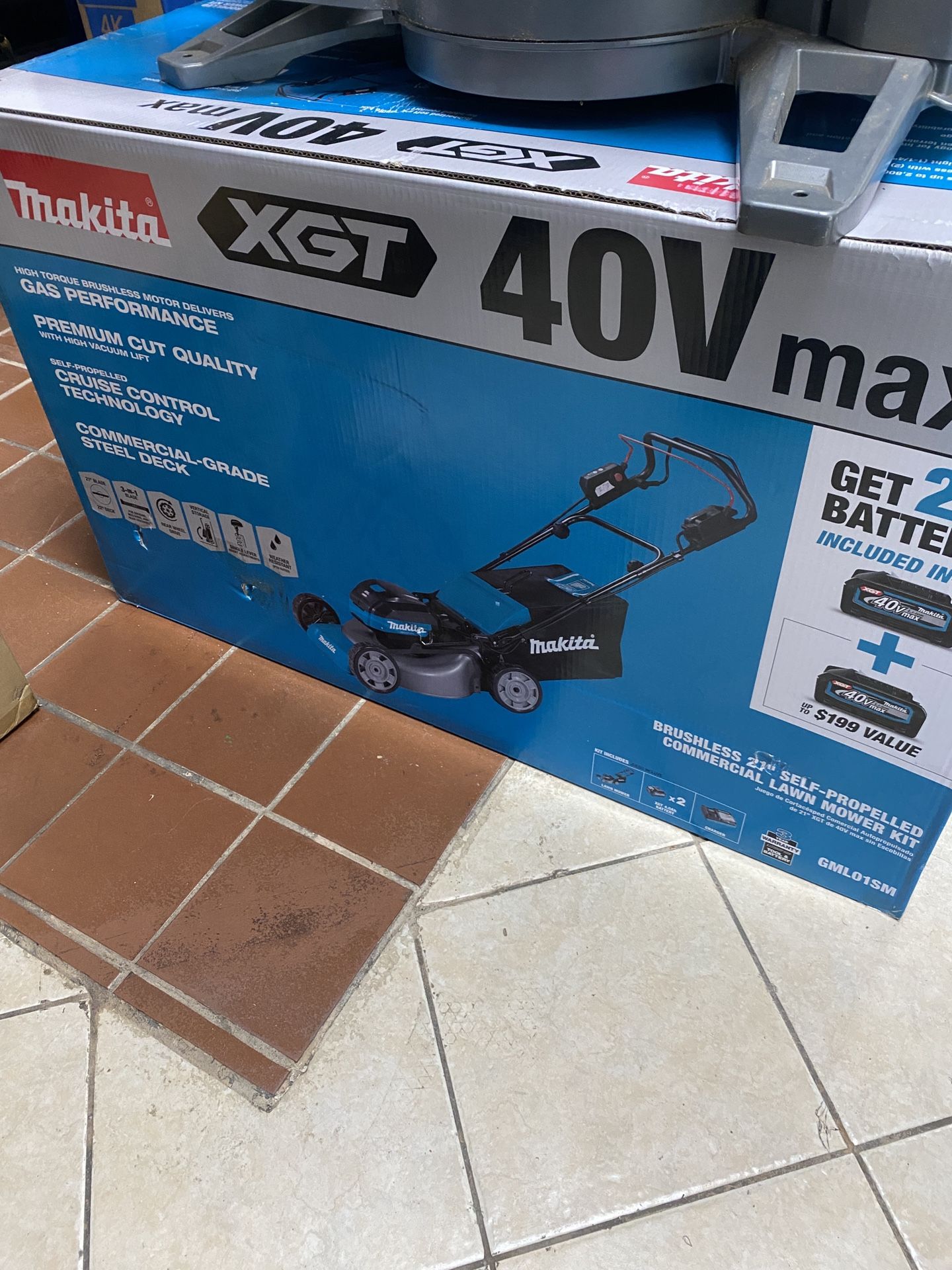 $850 - Brand New XGT 40V Max Cordless Propelled Commercial Lawn Mower