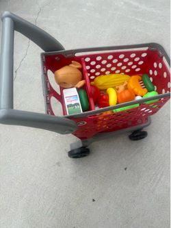 Toy target shopping cart with some groceries