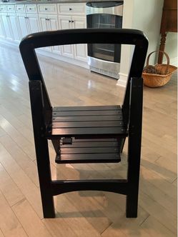 Sleek and sturdy solid wood 2-step folding stool in excellent condition! Folds Flat
