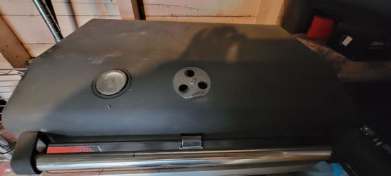 Asador de carbón  nunca usado