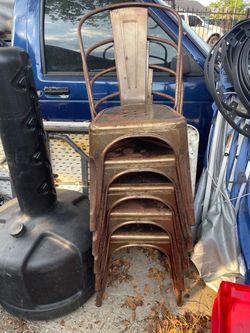 5 metal chairs