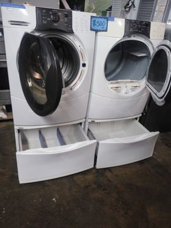 Kenmore front load washer and dryer set working perfectly with 4 months warranty
