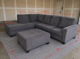 Pre-Owned 2-Piece Gray Sectional Sofa – Clean & Comfortable