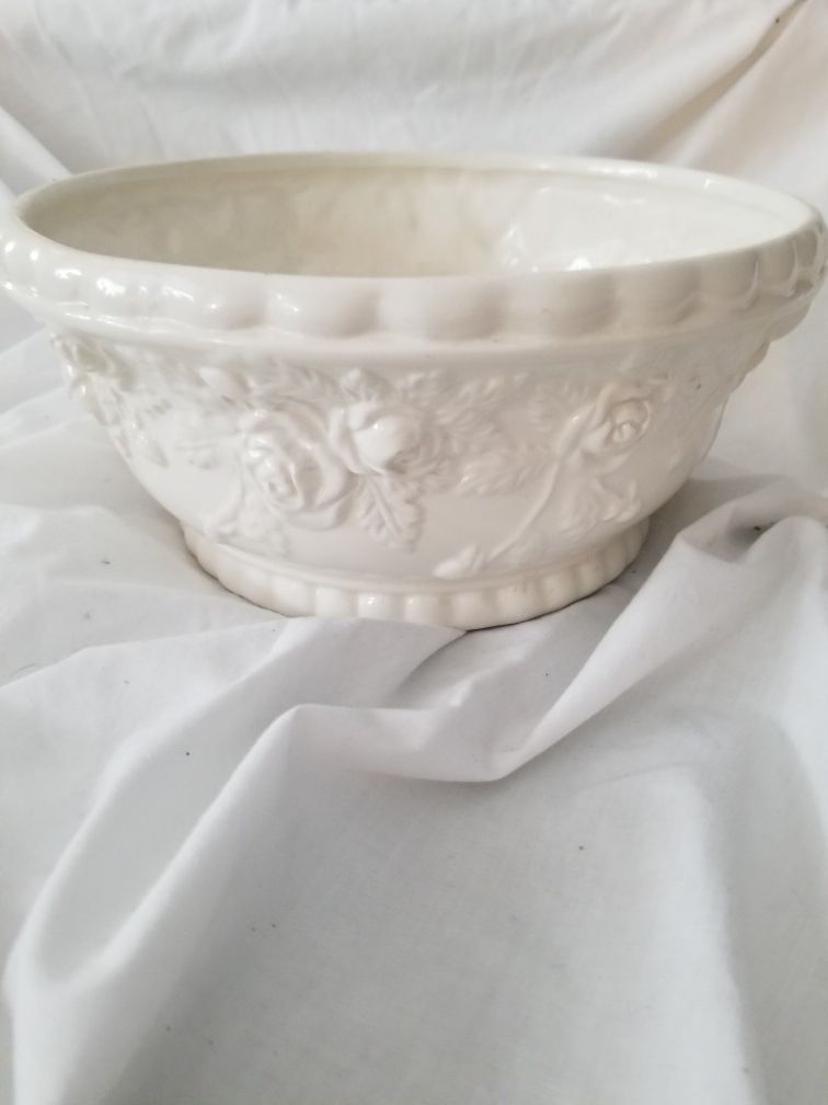 Elaborate vintage Bowl with flowers 9 and a 1/2 inches Across