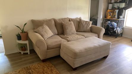 Couch with foot rest, and love seat