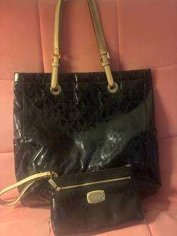 $50 Michael Kors wristlet/purse &matching large purse