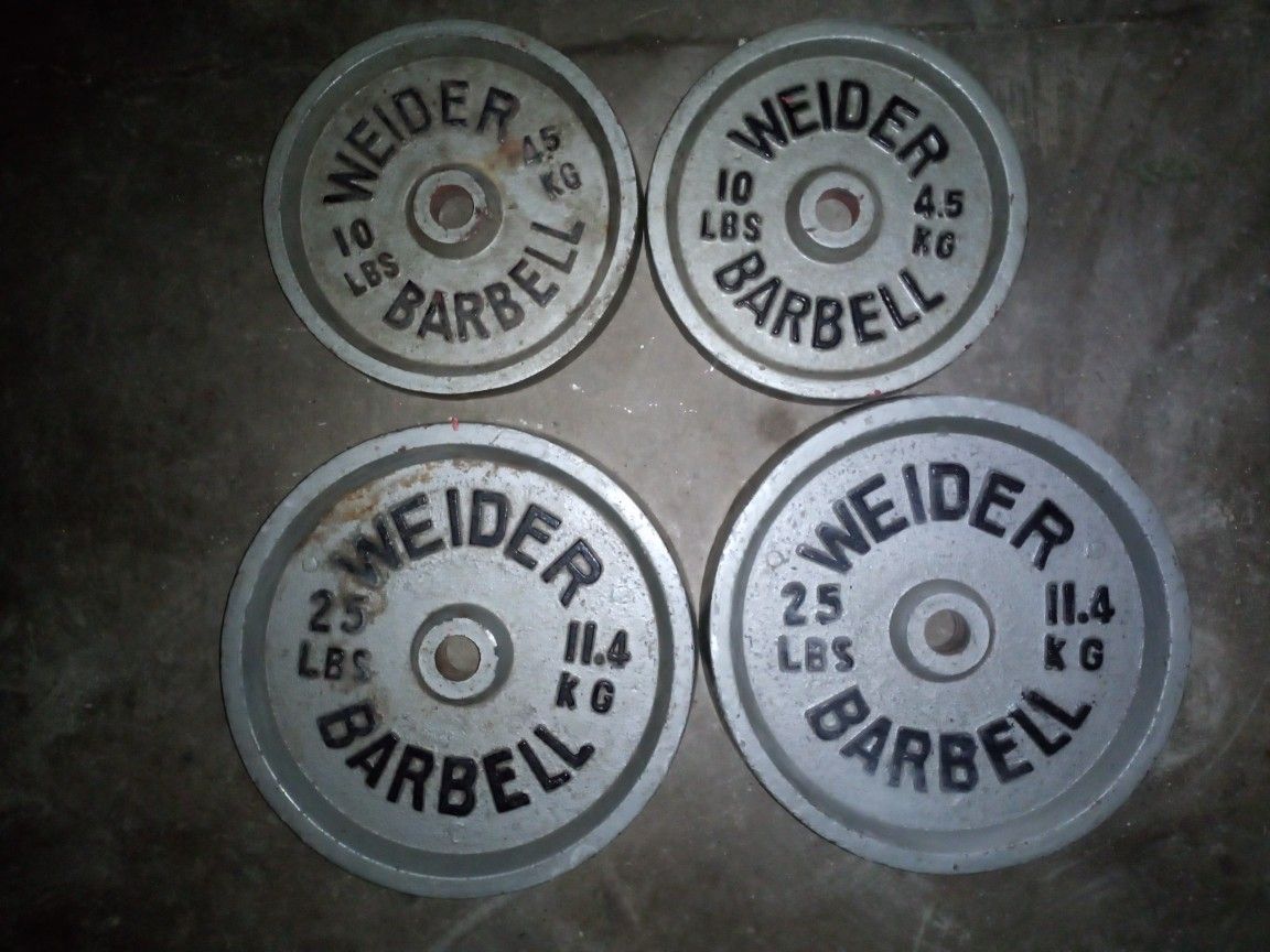 70 lb of weight 1 inch hole Weider barbell