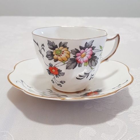 Rosina Bone-China Cup and Soucer Colorful Daisy Pattern ( #4921) Made In England.