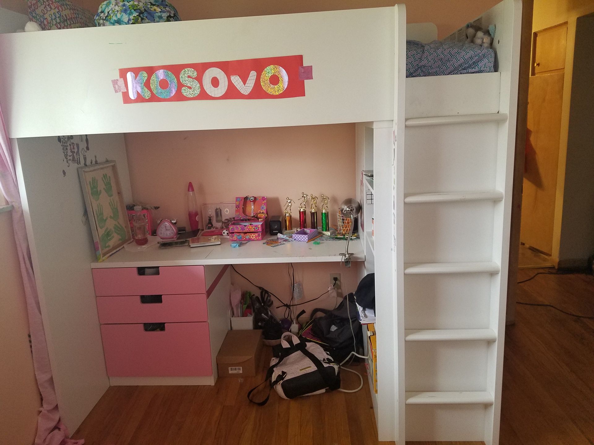 IKEA Kids Loft Bed with 2 drawers, 2 doors, book shelves , desk, wardrobe.