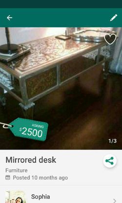 Mirrored desk with gold scroll