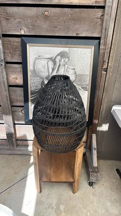 Black hanging wicker/rattan lamp