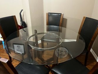 Glass kitchen table set with 6 chairs  $200 O.B.O