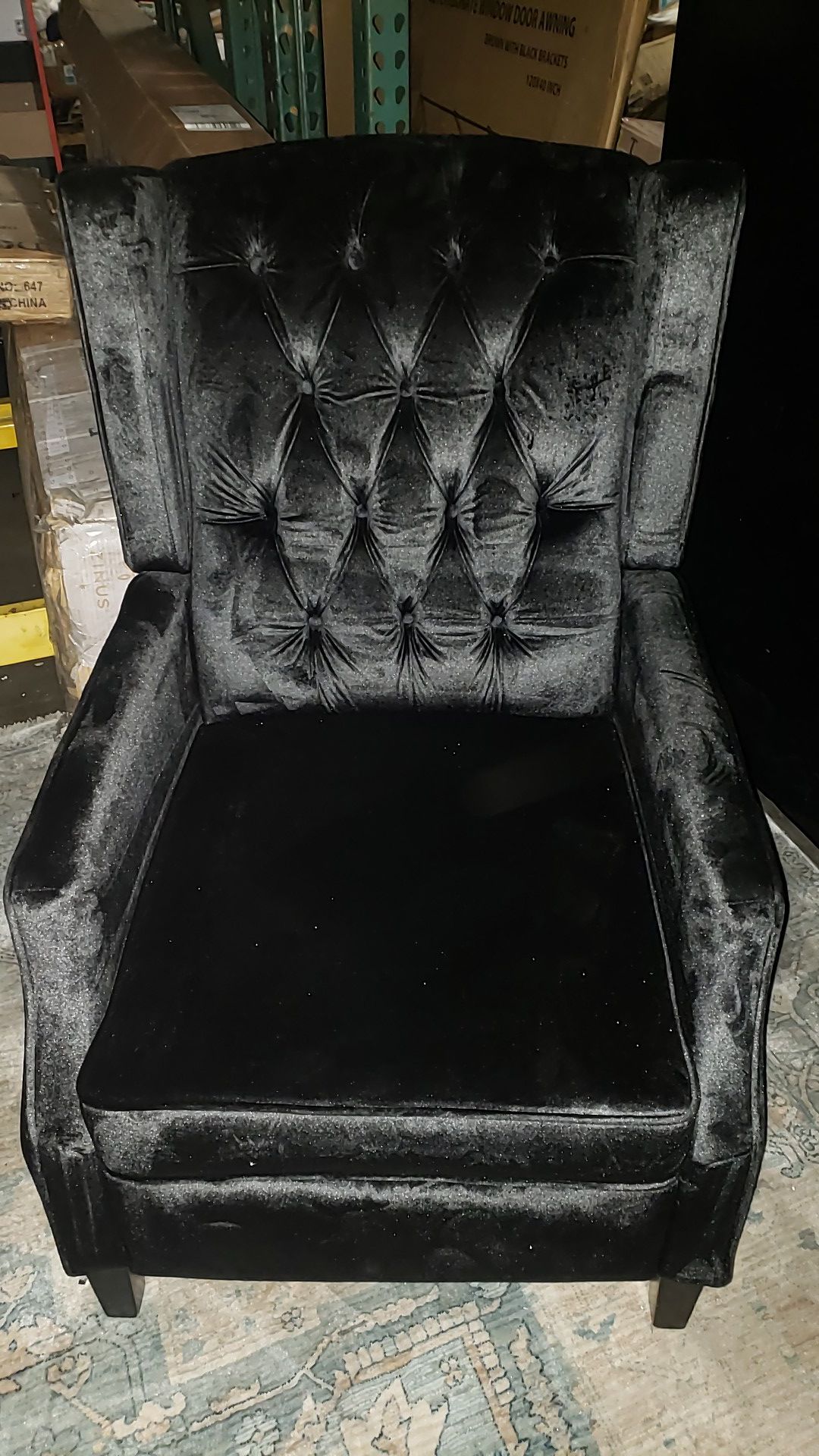 Keating traditional tufted back black velvet recliner