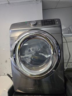 Samsung front load stainless steel heavy-duty large capacity electric dryer.
