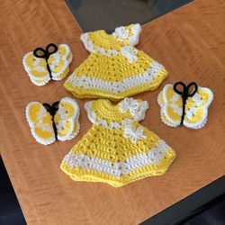 Handmade Crochet Two Dresses And Three Butterflies.  Can Be Hang  Or They Have A Small Magnet On The Back. See Pictures.  $20. For All 