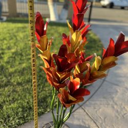 metal garden art flowers.  made from iron designed for outdoor display. They are durable and weather-resistant, intended to last indefinitely as a per