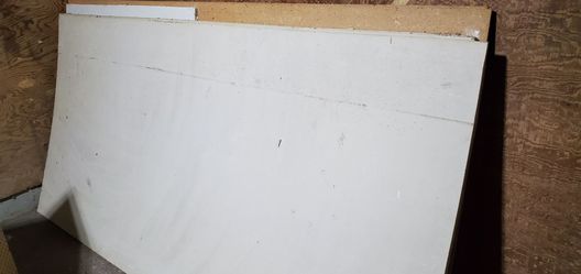 Free 4x8 sheet rock (3) and 2 particle boards