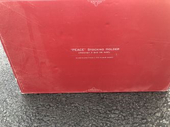 PotteryBarn brand new never opened PEACE stocking holders