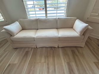 Cream ribbed sofa