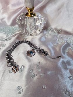 STERLING SILVER CHARM BRACELET W/ DECEMBER ZIRCON CHARM