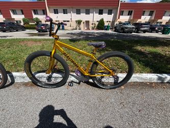 SE Bike BEASTMODE, Gold and Purple tire size 27.5 in