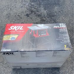 **New** SKIL 10” in Table saw With Stand in Box