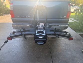 Thule easyfold xt 2 e bike rack for 2 bikes has foldable ramp and 2 keyes like new over $1200 new