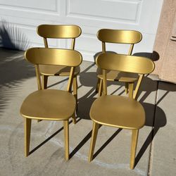 A Set Of  4  Wooden Chairs   Gold Color 