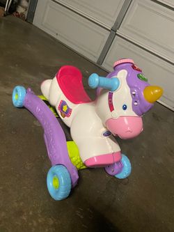Vtech Unicorn rocker push and ride toy
