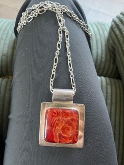 Native American silver charm