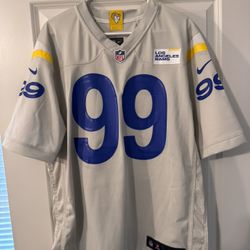 Authentic Aaron Donald bone color jersey in size Large. Brand new. Purchased at Sofi Stadium. $100 OBO
