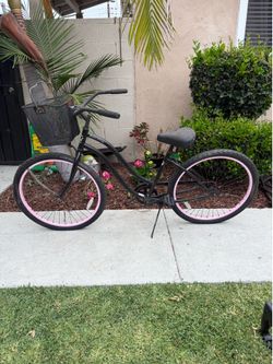 Beach cruiser for sale black one with pink rims $40