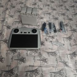 DJI RC control, Batteries(mini 3), Extra Propellers, Screw Driver, and Backpack Strap Mount 