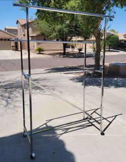 Heavy-Duty Commercial Double Rail Rolling Clothing Rack - in Surprise